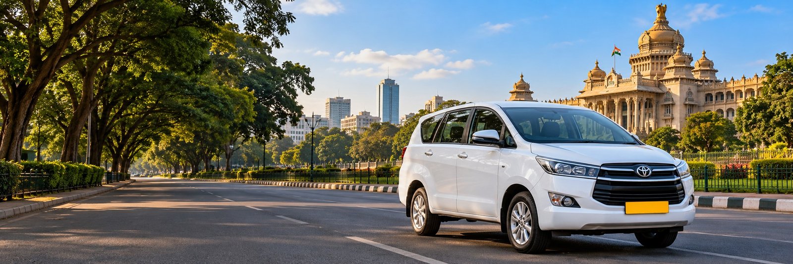 White taxi beside Vidhana Soudha in Bangalore
